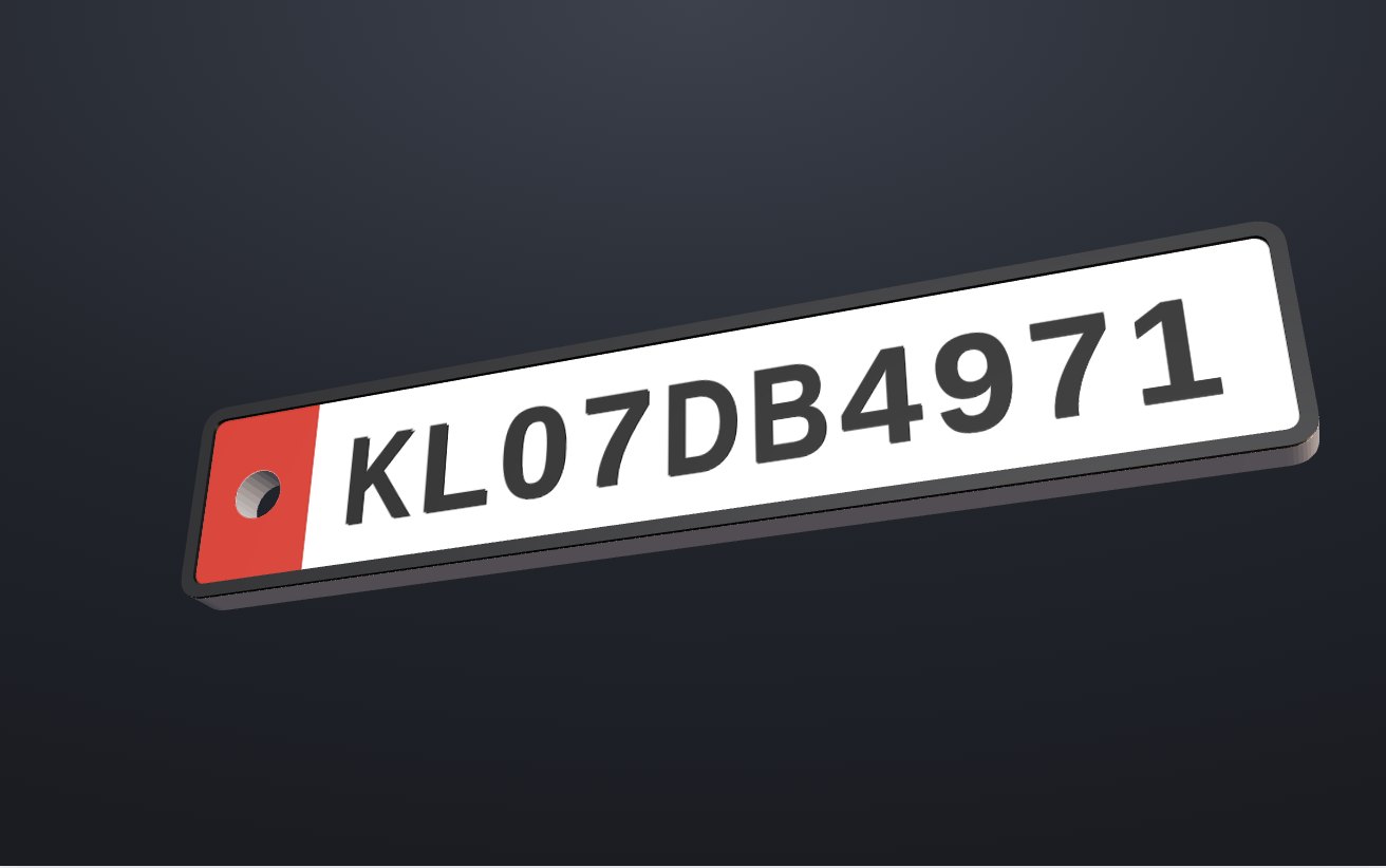 A finished miniature number-plate keychain, lit from the upper left